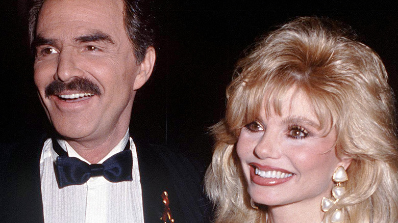 Burt Reynolds and Loni Anderson smiling