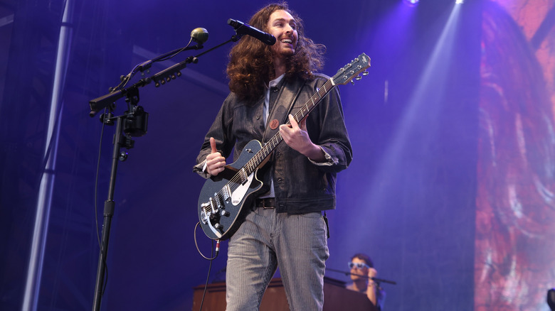 Hozier performing on stage
