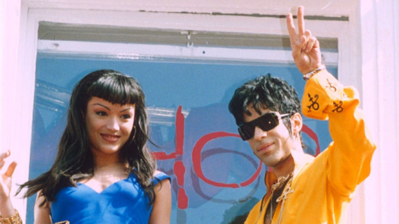 Mayte Garcia and Prince on balcony