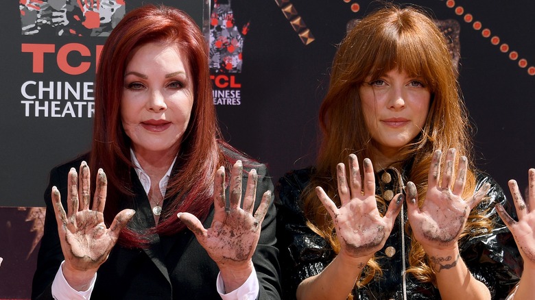 Priscilla Presley and Riley Keough show their inked hands