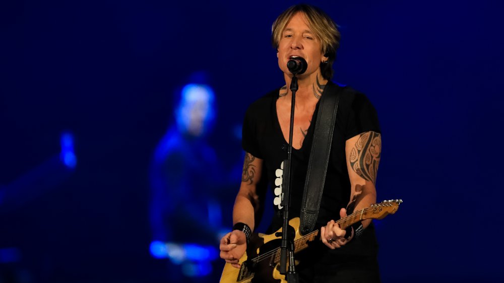 Keith Urban performing on stage