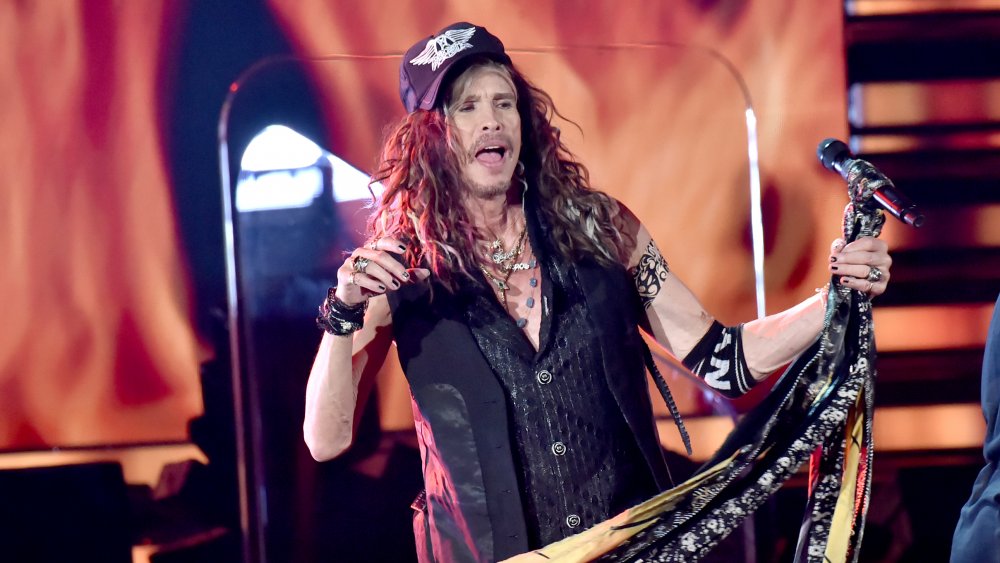 Steven Tyler performing on stage
