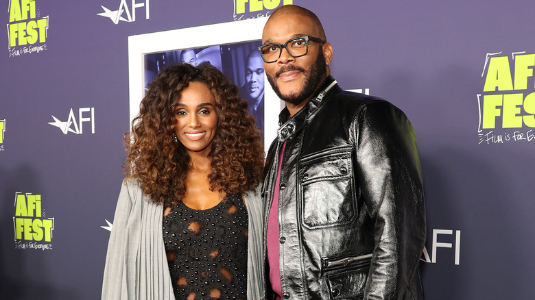 Tyler Perry and Gelila Bekele smling