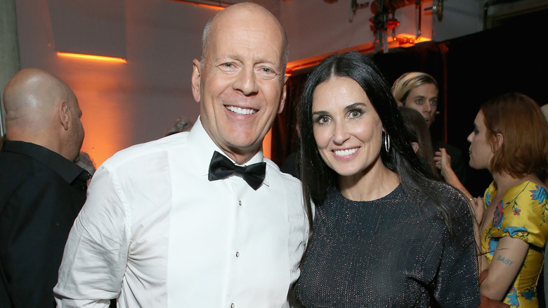 Bruce Willis and Demi Moore smiling