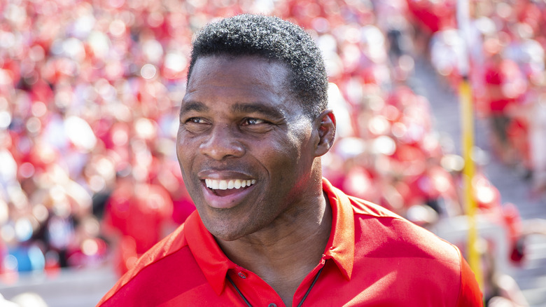 Georgia alum Herschel Walker on the sidelines during a 2019 football game in Athens, Georgia