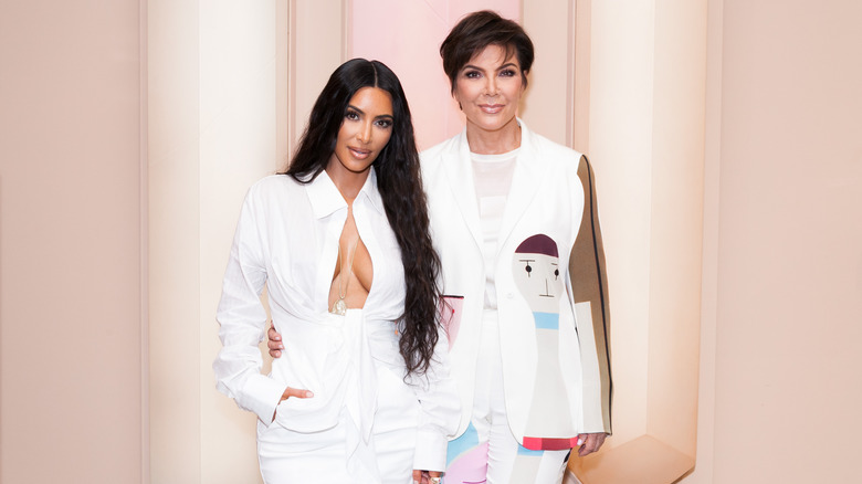 Kris Jenner posing with Kim Kardashian