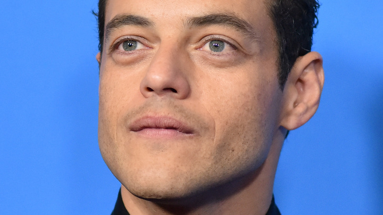 Rami Malek posing