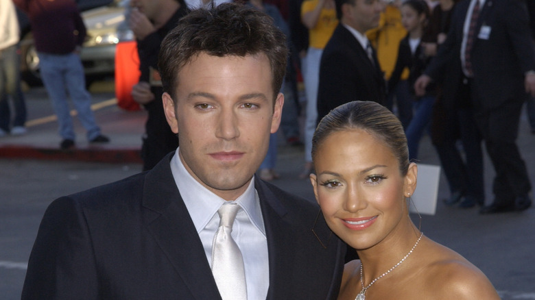 Ben Affleck posing with Jennifer Lopez