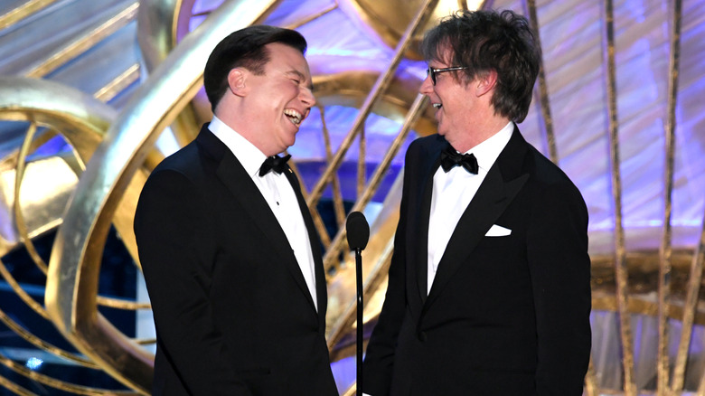 Mike Myers and Dana Carvey, both laughing