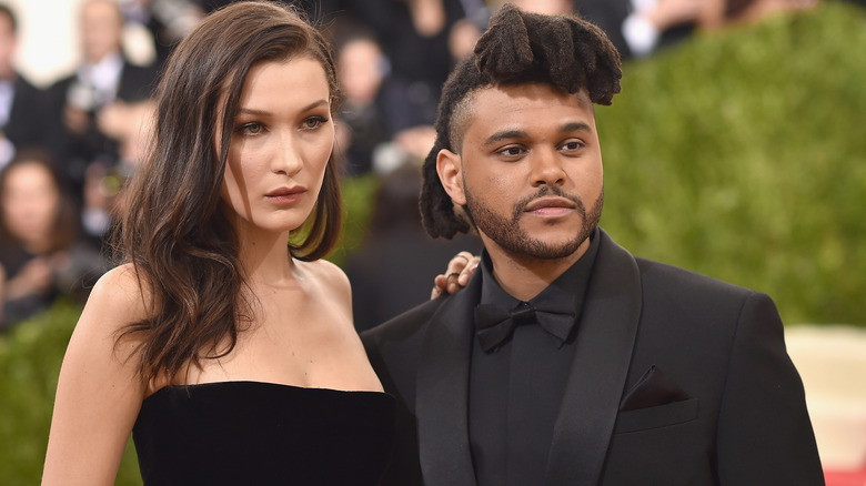 Bella Hadid and The Weeknd posing