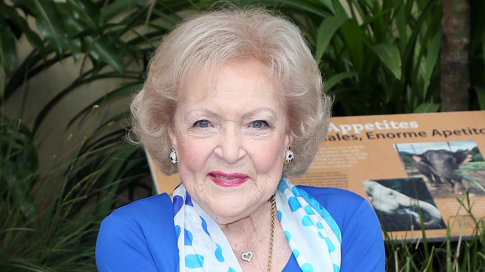 Betty White smiling at an animal event