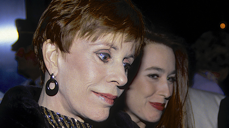 Carol Burnett looking down beside Erin Hamilton