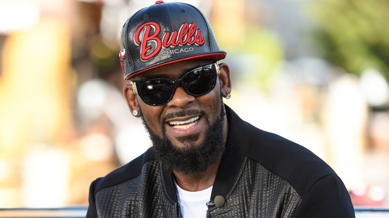 R. Kelly smiling