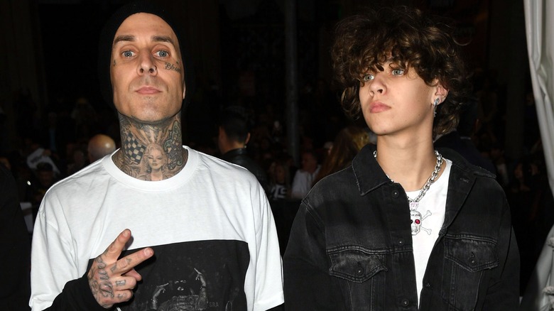 Travis Barker and Landon Asher Barker attends the premiere of Sony Pictures' "Jumanji: The Next Level" 