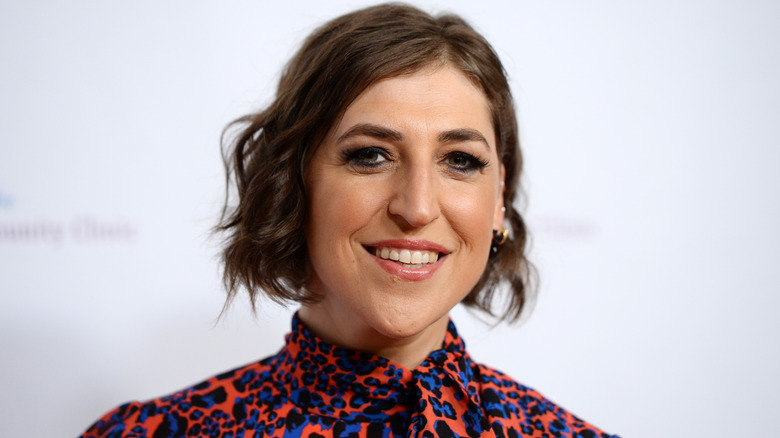 Mayim Bialik smiling on red carpet