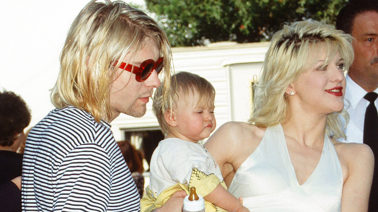 Kurt Cobain with Courtney Love and Frances Cobain