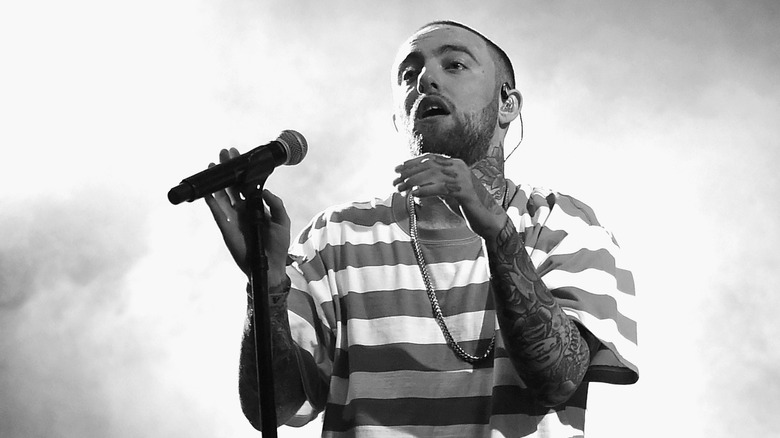 Mac Miller performing in black and white