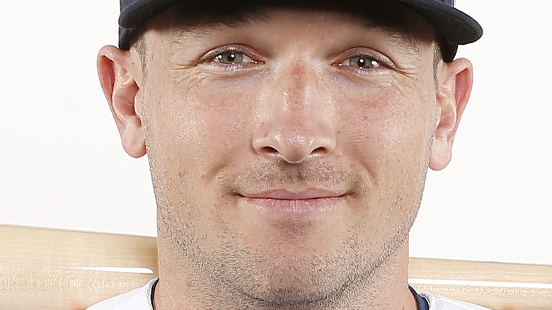 Alex Bregman smiles in a photoshoot