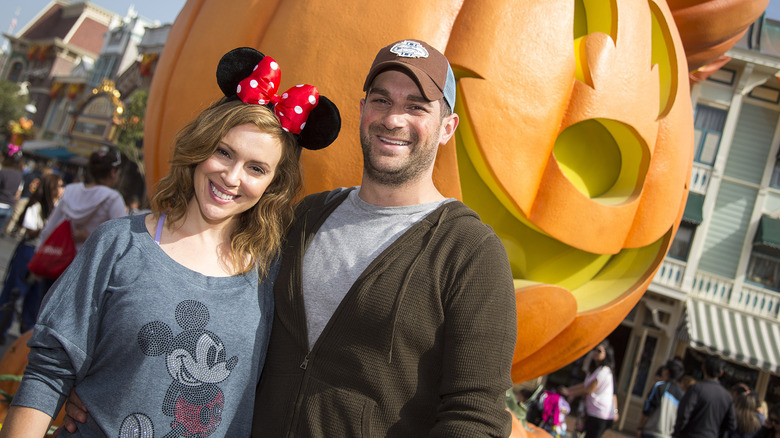 Alyssa Milano and David Bugilari smiling