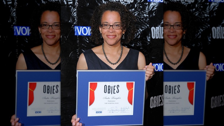 Ami with Andre's Obie award