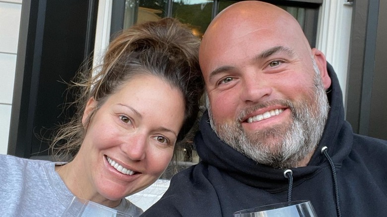 Melissa Whitworth and Andrew Whitworth smiling with head together