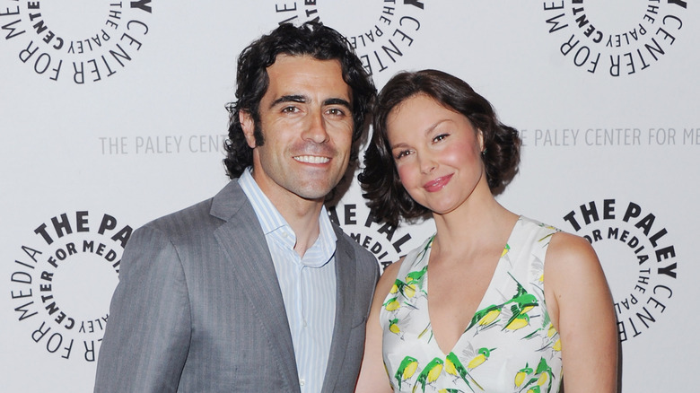 Dario Franchitti and Ashley Judd pose at red carpet event