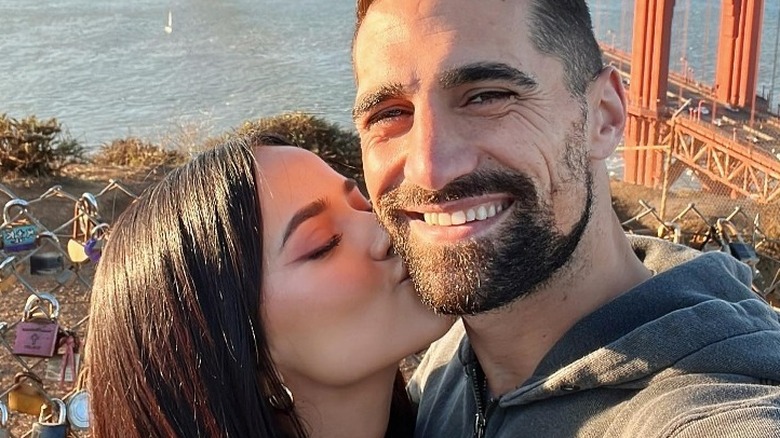 Becky G and Sebastián Lletget smiling