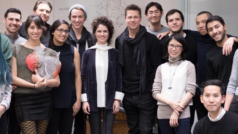 Neri Oxman and Brad Pitt pose with a group