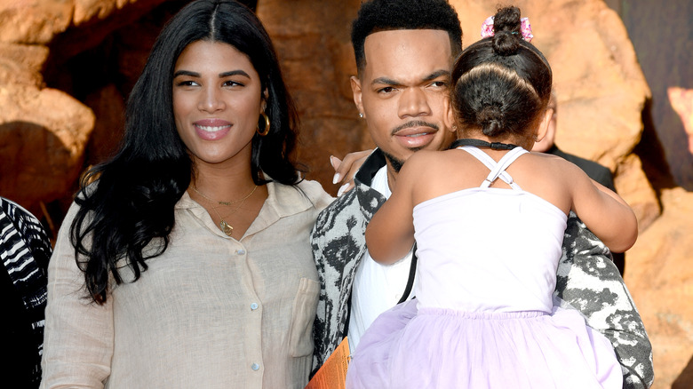 Kirsten Corley, Chance The Rapper, and Kensli Bennett attend the premiere of Disney's "The Lion King"