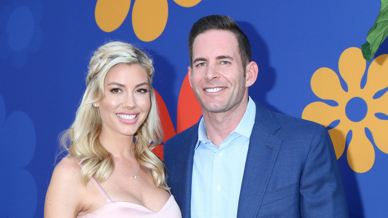 Heather Rae Young and Tarek El Moussa smile 