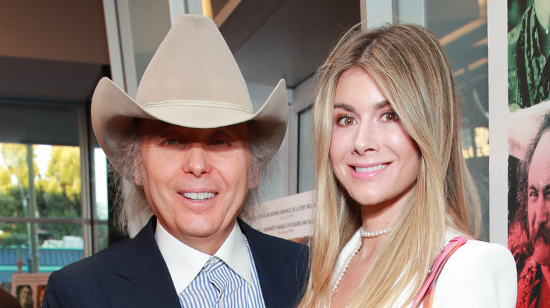 Dwight Yoakam and Emily Joyce smiling 