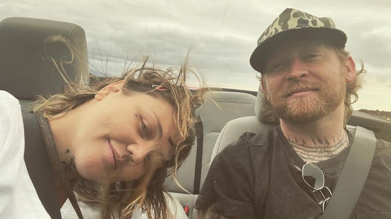 Elle King tilts head sideways alongside fiance Dan Tooker