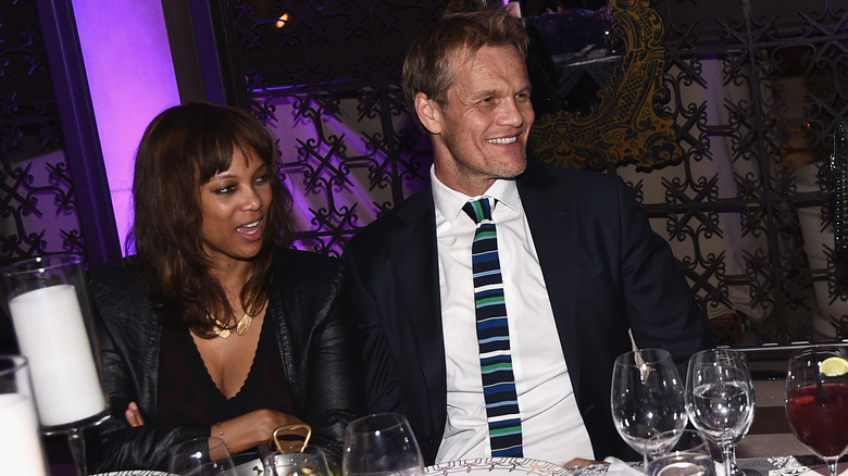 Tyra Banks and Erik Asla smiling