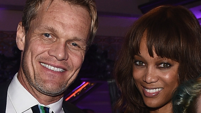 Tyra Banks and Erik Asla smiling