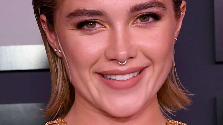 Florence Pugh smiling gold eyeshadow 