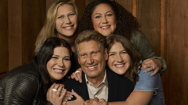 Gerry Turner posing with family