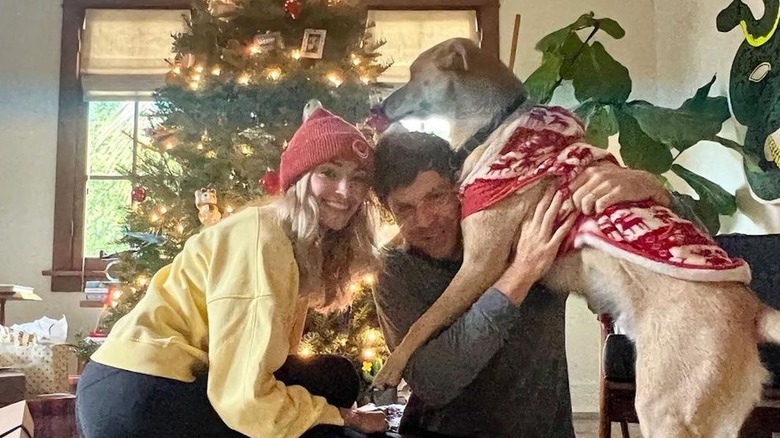 Brianne Howey and Matt Ziering with their dog