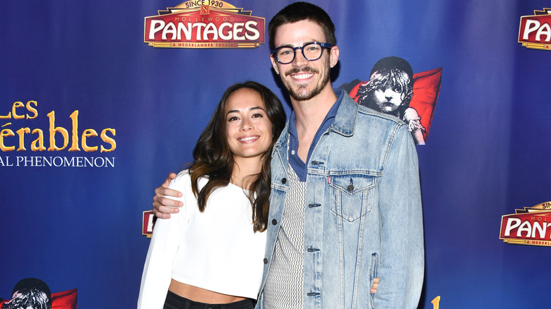 Grant Gustin posing with his wife Andrea Thoma