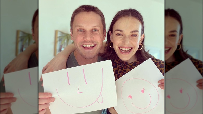 Elizabeth Henstridge and Zachary Abel smiling together