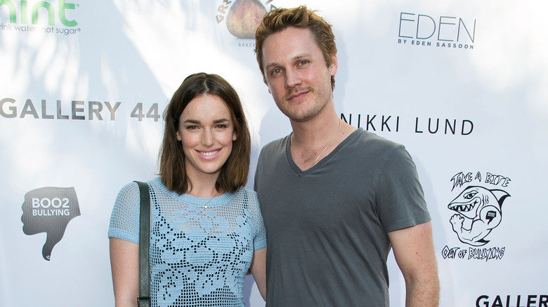 Elizabeth Henstridge and Zachary Burr Abel posing