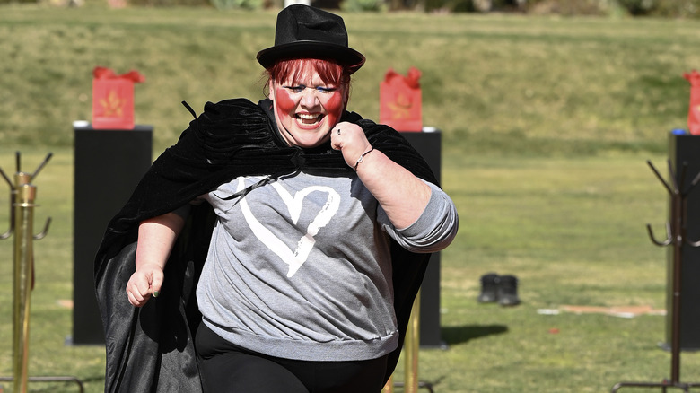 Contestant Jane in hat