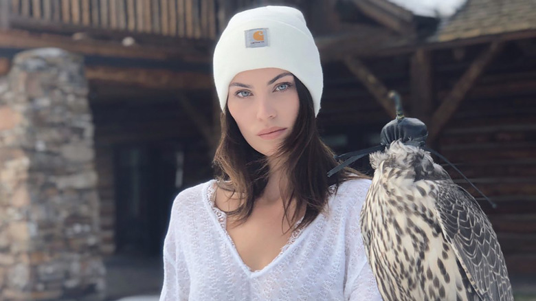 Samantha Robertson holding a falcon