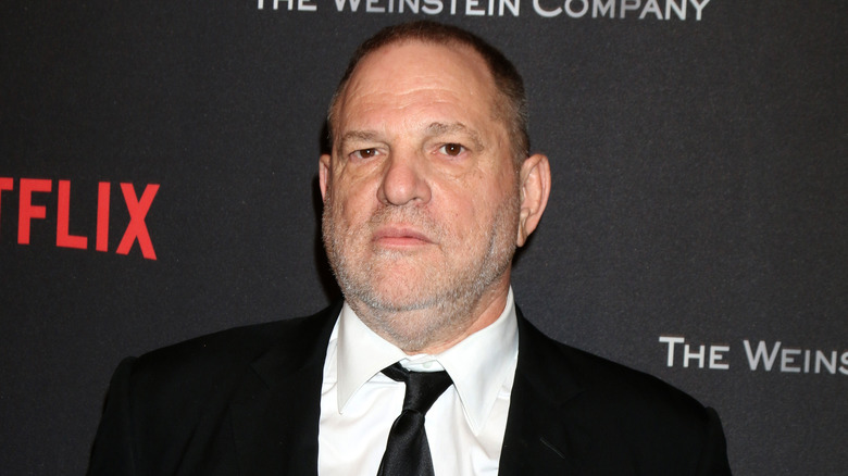 Harvey Weinstein in a black suit 