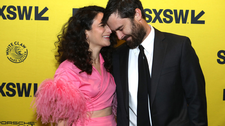 Jenny Slate Ben Shattuck whispering laughing