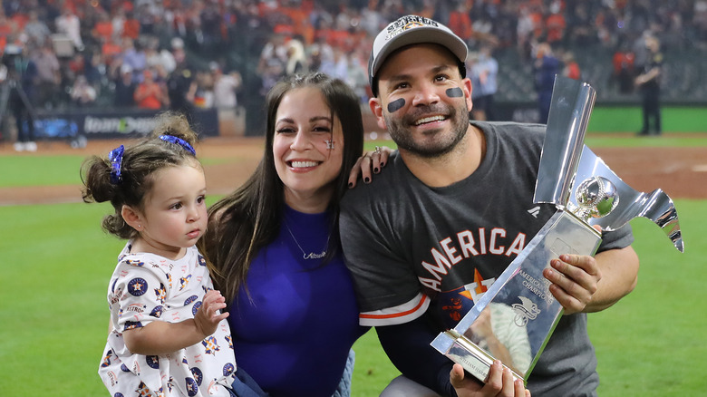 Jose and Nina Altuve with their daughter