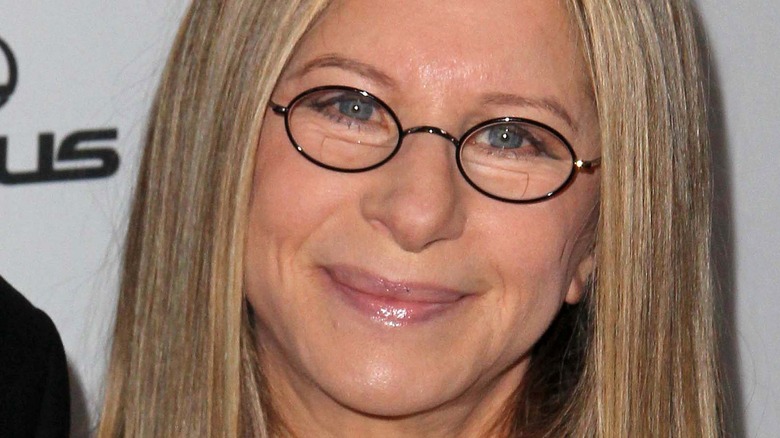 Barbra Streisand smiles on red carpet