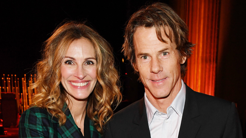 Julia Roberts and Danny Moder smiling at an event