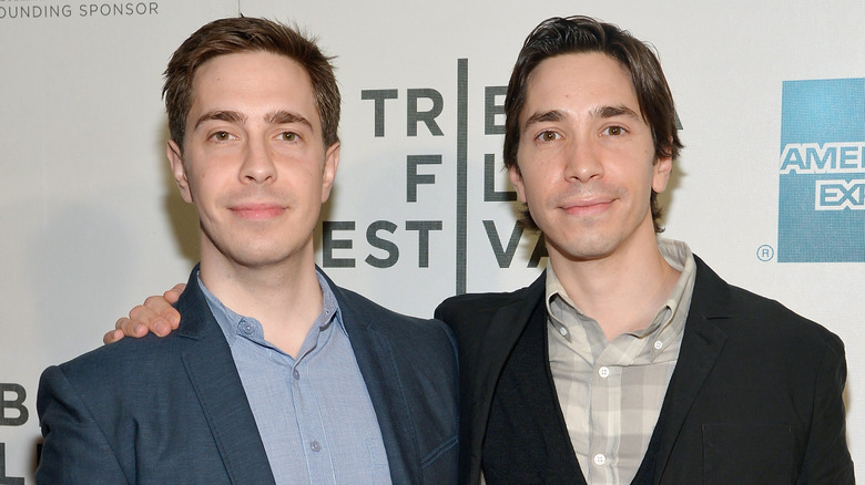 Christian Long and Justin Long slightly smiling