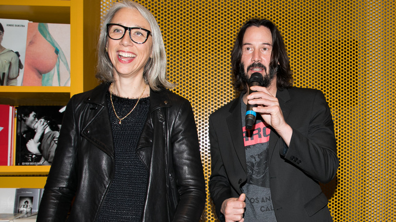 Alexandra Grant and Keanu Reeves onstage