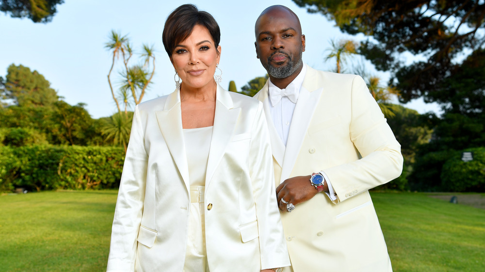 Kris Jenner and Corey Gamble attend the amfAR Cannes gala in 2019